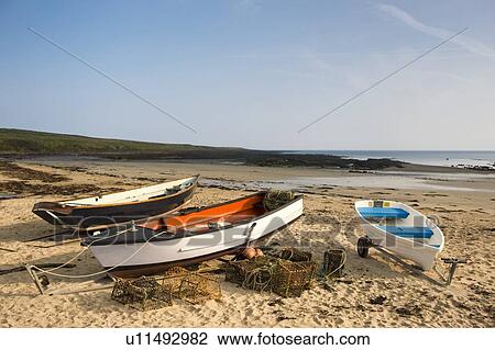 Empty boats on beach, Northumberland, England View Large Photo Image Stock Image - Empty boats on beach, Northumberland, England. Fotosearch