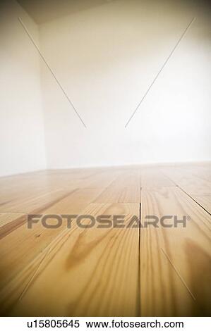 Empty room with wooden floors and white walls View Large Photo Image Stock Photography - Empty room with wooden floors and white walls. Fotosearch