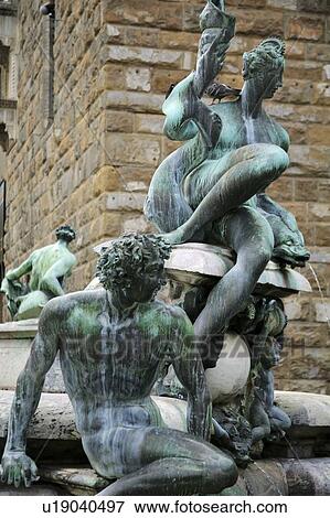 Stock Photo - Florence, Italy; Bronze satyrs Sea nymphs on the fountain of Neptune. Fotosearch