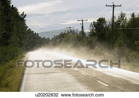 Stock Image - Foggy road. Fotosearch