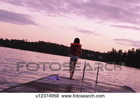 Girl going swimming View Large Photo Image Stock Photo - Girl going swimming. Fotosearch