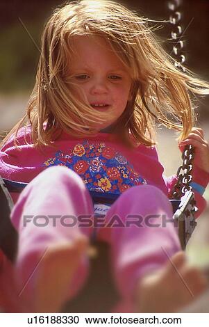 Girl on swing View Large Photo Image Stock Image - Girl on swing. Fotosearch
