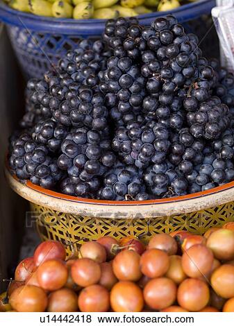 Grapes and Mangosteens, Bali, Asia; Baskets of fruits in a market View Large Photo Image Stock Photo - Grapes and Mangosteens, Bali, Asia; Baskets of fruits in a market. Fotosearch