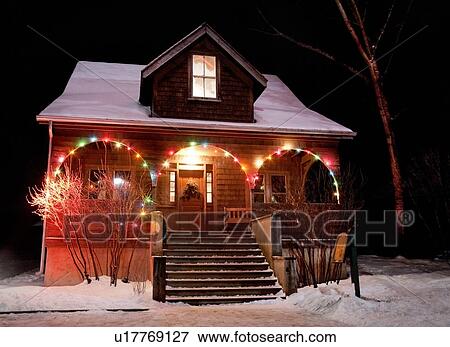 Stock Photo - House with Christmas lights. Fotosearch