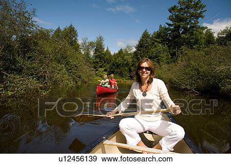In a canoe, Muskokas, Ontario, Canada View Large Photo Image Stock Photo - In a canoe, Muskokas, Ontario, Canada . Fotosearch
