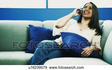 Stock Photo - Interesting telephone conversation. Fotosearch