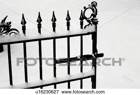 Iron gate covered in snow View Large Photo Image Stock Photo - Iron gate covered in snow. Fotosearch