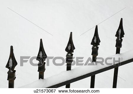Iron gate covered in snow View Large Photo Image Stock Photo - Iron gate covered in snow. Fotosearch