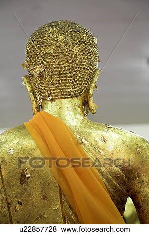 Isan, Thailand; Golden Buddha statue with orange sash View Large Photo Image Stock Photo - Isan, Thailand; Golden Buddha statue with orange sash. Fotosearch