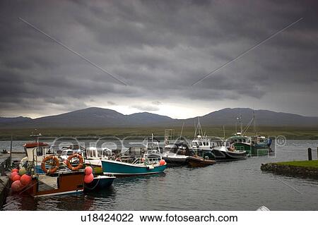 Islay, Scotland; Row of boats at a jetty View Large Photo Image Stock Image - Islay, Scotland; Row of boats at a jetty. Fotosearch