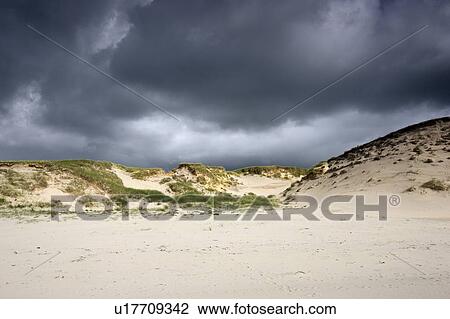 Islay, Scotland; Storm clouds over a beach View Large Photo Image Stock Image - Islay, Scotland; Storm clouds over a beach. Fotosearch