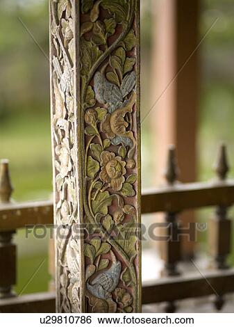 Stock Photograph - Klungkung, Bali, Indonesia; Carved post. Fotosearch