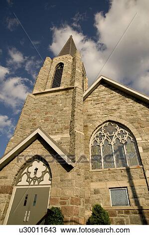 Stock Image - Lake of the Woods, Kenora, Ontario, Canada; Church spire rising into the air. Fotosearch