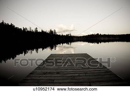 Lake of the Woods, Ontario, Canada; Pier looking out over lake View Large Photo Image Picture - Lake of the Woods, Ontario, Canada; Pier looking out over lake. Fotosearch