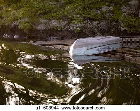 Lake of the Woods, Ontario, Canada; Boat on a dock View Large Photo Image Picture - Lake of the Woods, Ontario, Canada; Boat on a dock . Fotosearch