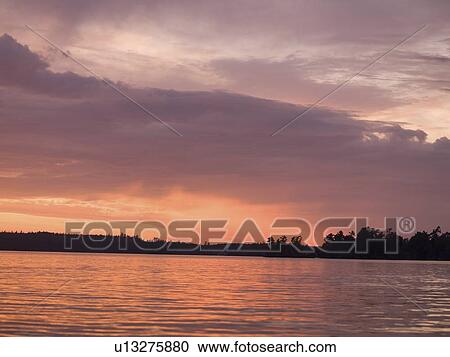 Lake of the Woods, Ontario, Canada; Twilight over still lake water View Large Photo Image Stock Image - Lake of the Woods, Ontario, Canada; Twilight over still lake water. Fotosearch