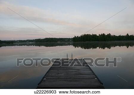 Lake of the Woods, Ontario, Canada; Pier leading to lake View Large Photo Image Stock Image - Lake of the Woods, Ontario, Canada; Pier leading to lake. Fotosearch