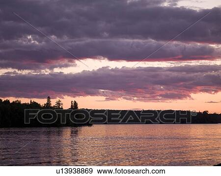 Lake of the Woods, Ontario, Canada; Sunrise over lake View Large Photo Image Stock Photo - Lake of the Woods, Ontario, Canada; Sunrise over lake. Fotosearch