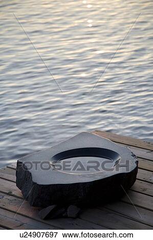 Lake Of The Woods, Ontario, Canada, Birdbath on pier next to lake View Large Photo Image Stock Photo - Lake Of The Woods, Ontario, Canada, Birdbath on pier next to lake. Fotosearch