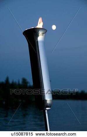 Lake of the Woods, Ontario, Canada; Torch burning brightly at night View Large Photo Image Stock Photography - Lake of the Woods, Ontario, Canada; Torch burning brightly at night. Fotosearch