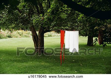Stock Photography - Laundry drying on line outdoors, Waterloo, Quebec, Canada. Fotosearch