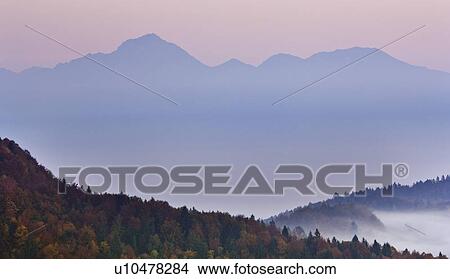 Picture - Ljubljana, Slovenia; Mist over Ljubljana Basin. Fotosearch