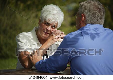 Picture - Man comforting woman. Fotosearch