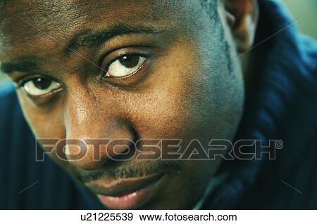 Stock Photo - Man with brown eyes. Fotosearch