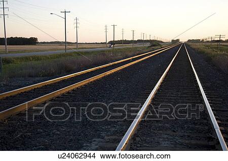 Manitoba, Canada; Railways tracks across the prairies View Large Photo Image Picture - Manitoba, Canada; Railways tracks across the prairies. Fotosearch