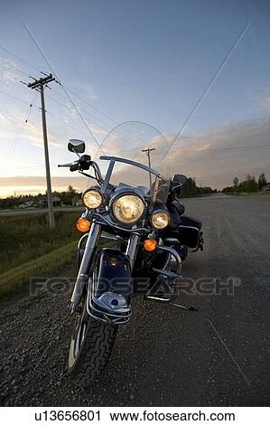 Motorcycle on side of road, Manitoba, Canada View Large Photo Image Stock Image - Motorcycle on side of road, Manitoba, Canada. Fotosearch