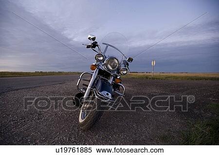 Stock Photography - Mototorcycle on side of road, Manitoba, Canada. Fotosearch