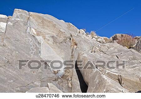 Stock Photograph - Native American petroglyphs found in the Owens Valley, California, USA . Fotosearch
