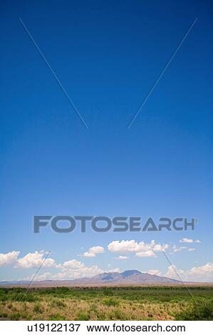 New Mexico, USA; Desert landscape with the Manzano Mountains in the distance View Large Photo Image Stock Photo - New Mexico, USA; Desert landscape with the Manzano Mountains in the distance. Fotosearch