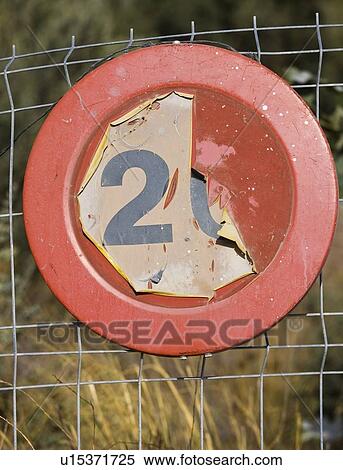 Old faded 20 kilometer per hour road sign on chain link fence View Large Photo Image Stock Photography - Old faded 20 kilometer per hour road sign on chain link fence. Fotosearch