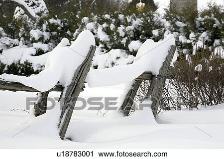 Old wooden fence covered in snow View Large Photo Image Stock Image - Old wooden fence covered in snow. Fotosearch