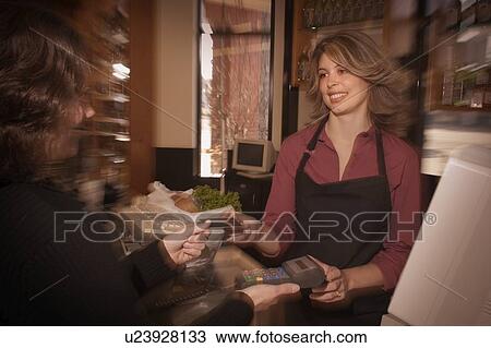 Stock Image - Payment for goods. Fotosearch