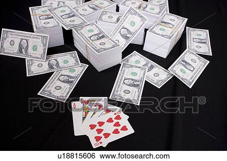 Piles of money and cards View Large Photo Image Stock Photograph - Piles of money and cards. Fotosearch