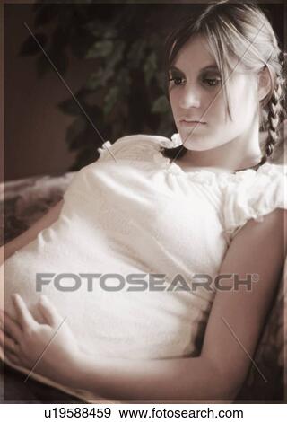 Portrait of a pregnant woman View Large Photo Image Stock Photo - Portrait of a pregnant woman. Fotosearch