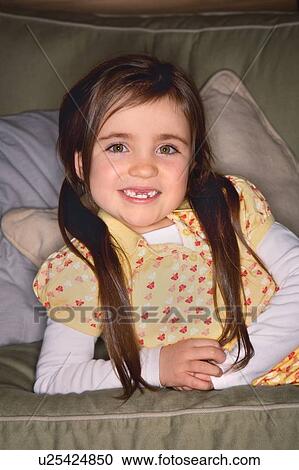 Stock Image - Portrait of a young girl. Fotosearch