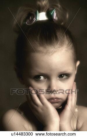 Stock Image - Portrait of Girl getting ready for dance recital. Fotosearch
