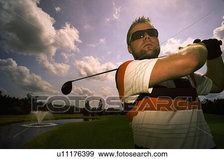 Portrait of young male golfer View Large Photo Image Stock Photo - Portrait of young male golfer. Fotosearch