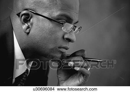 Picture - Profile of a businessman. Fotosearch