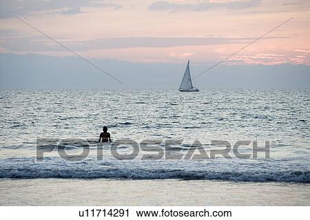 Puerto Vallarta, Mexico; Person in the water View Large Photo Image Stock Image - Puerto Vallarta, Mexico; Person in the water. Fotosearch