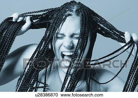 Stock Image - Pulling out your hair. Fotosearch