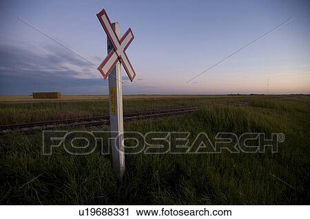 Stock Image - Railroad crossing sign, Manitoba, Canada. Fotosearch