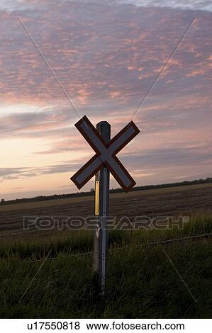 Railroad crossing sign, Manitoba, Canada View Large Photo Image Stock Photo - Railroad crossing sign, Manitoba, Canada. Fotosearch