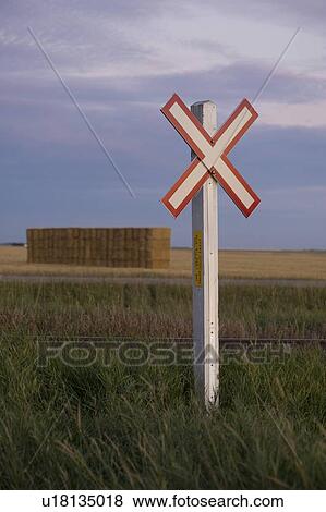 Stock Photo - Railroad crossing sign, Manitoba, Canada. Fotosearch