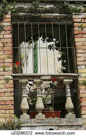 Stock Image - Ravello, Italy; Barred window. Fotosearch