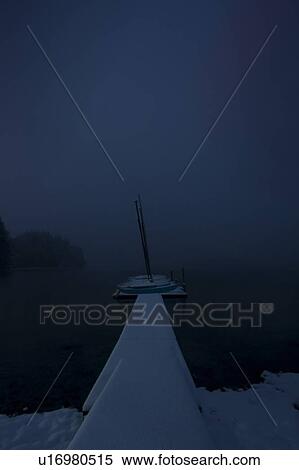 Recreation; Sailboat docked at night in winter View Large Photo Image Stock Photography - Recreation; Sailboat docked at night in winter. Fotosearch