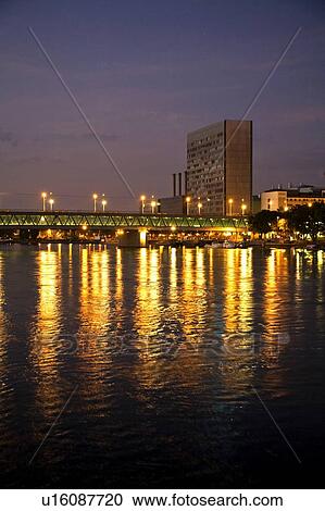 Rhine, Germany; Buildings and city lights reflected in the river View Large Photo Image Stock Image - Rhine, Germany; Buildings and city lights reflected in the river. Fotosearch